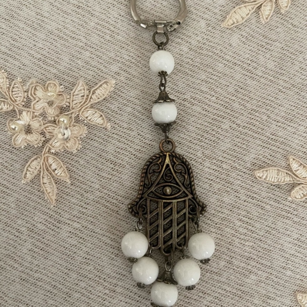 White beaded hamsa keychain